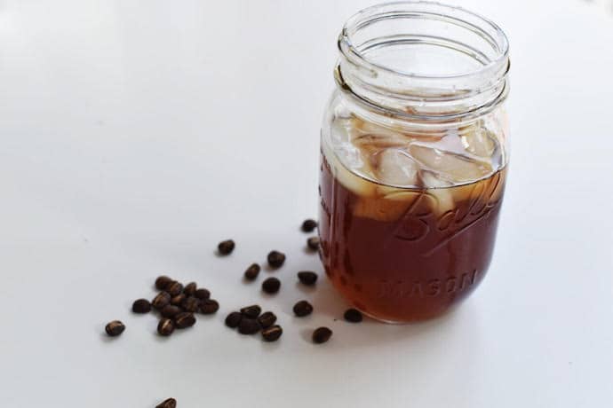 add ice - the last step for making cold brew coffee in a mason jar