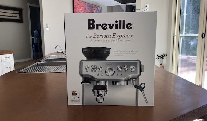 Breville barista express in box on kitchen counter
