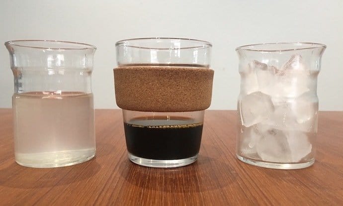 three glasses lined up in a row with coconut water, cold brew and ice