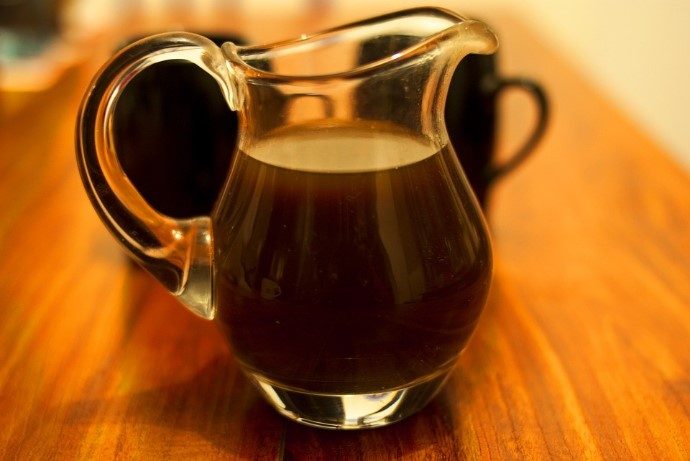 coffee pitcher on a brown table