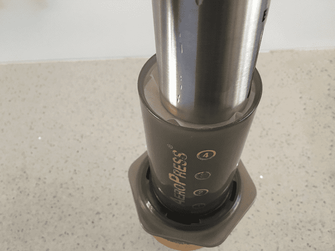 step 4 in adding the filter for brewing aeropress