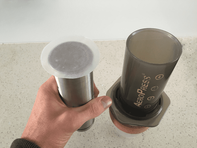 adding the filter on top of coffee chamber