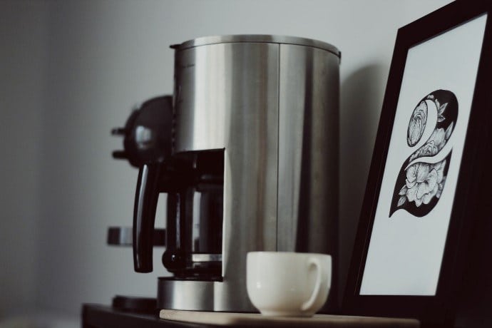 coffee drip machine and a cup