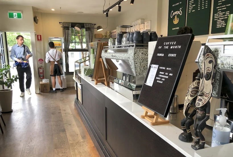 A photo of a cafe interior with great coffee equipment one needs..