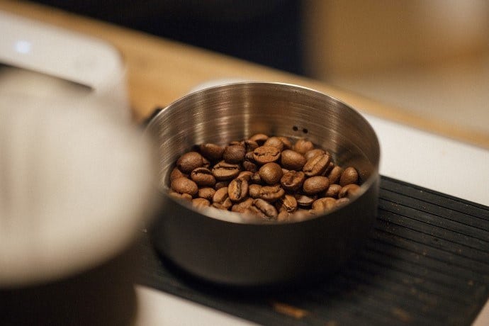 roasted-coffee-beans-in-metal-container