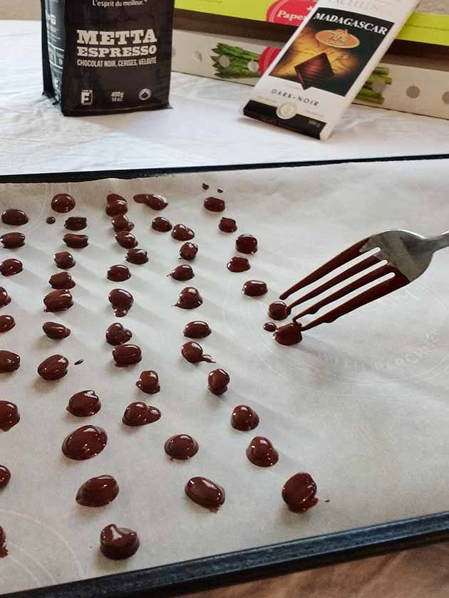 putting the beans on parchment paper