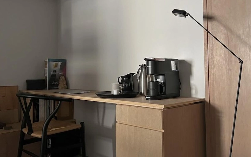Black Keurig coffee maker in a stylish home setting