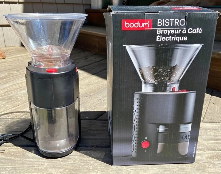 Bodum Bistro electric burr grinder next to it's box