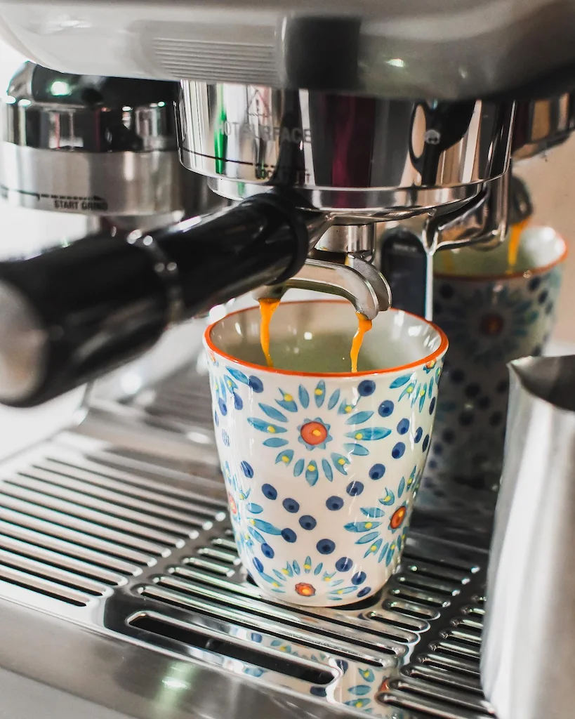 Breville the Oracle Touch with floral espresso cup
