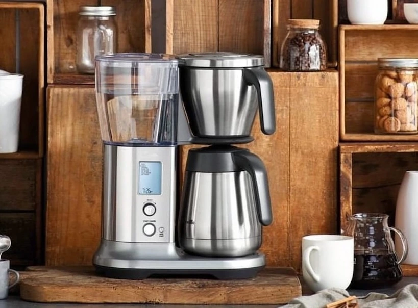 Stylish Breville Precision drip coffee maker in a wooden kitchen