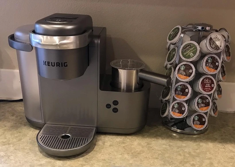 Silver Keurig K Cafe next to keurig k-cups in a kitchen