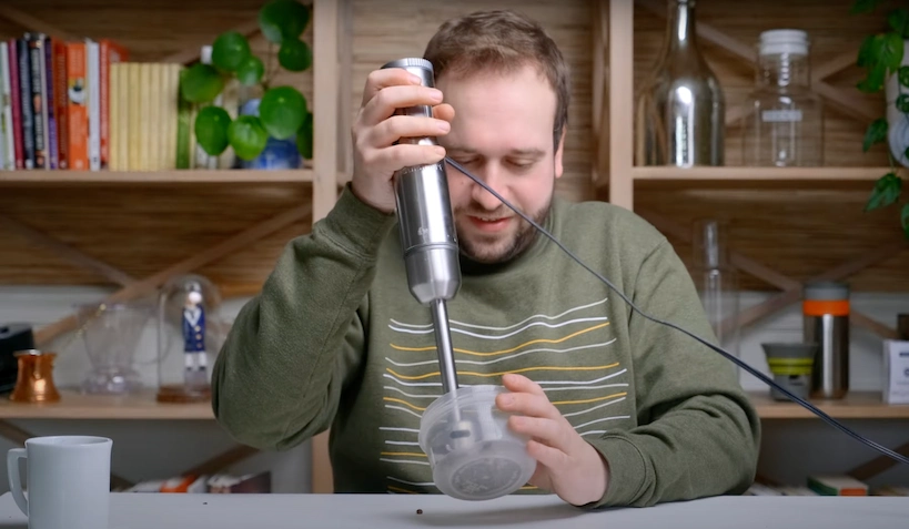 Steven grinding beans with the blender