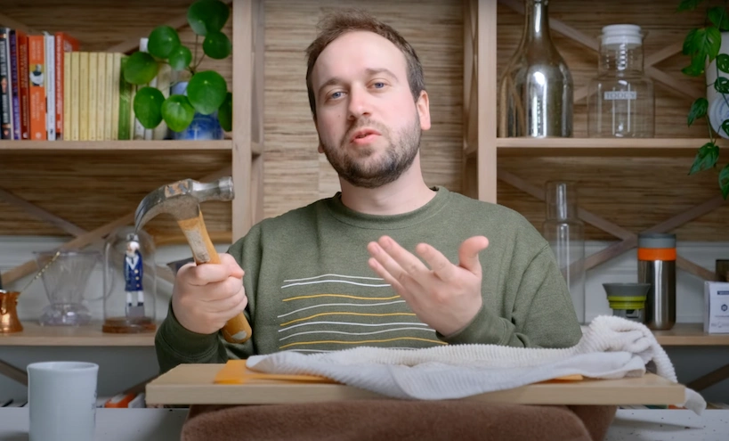 steven holding a hammer for a grinding trick
