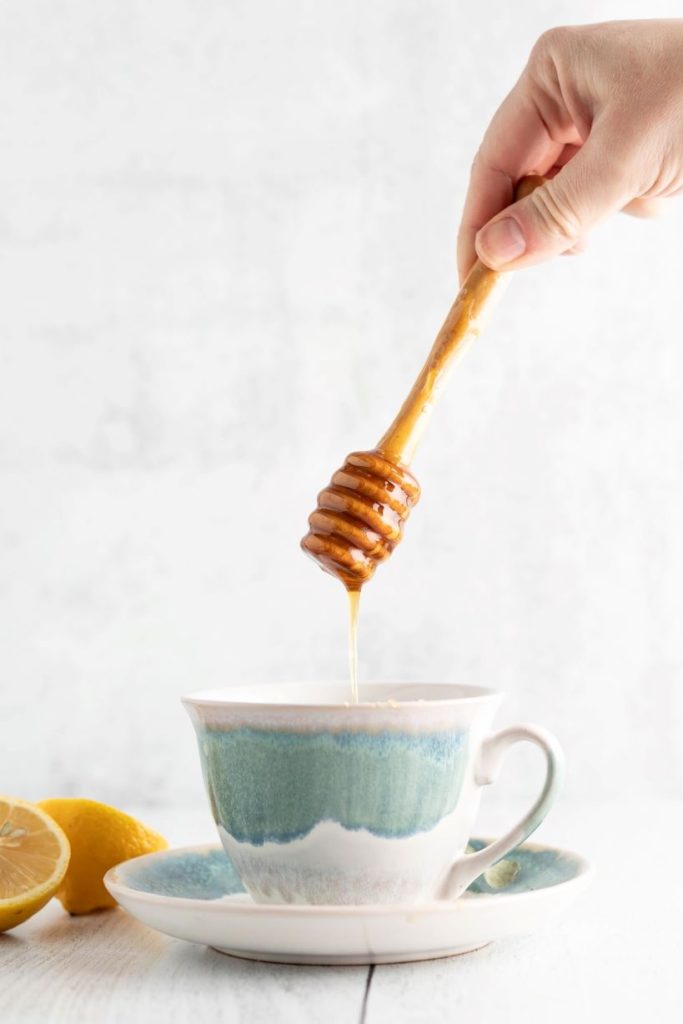 Pouring Hiney in Coffee
