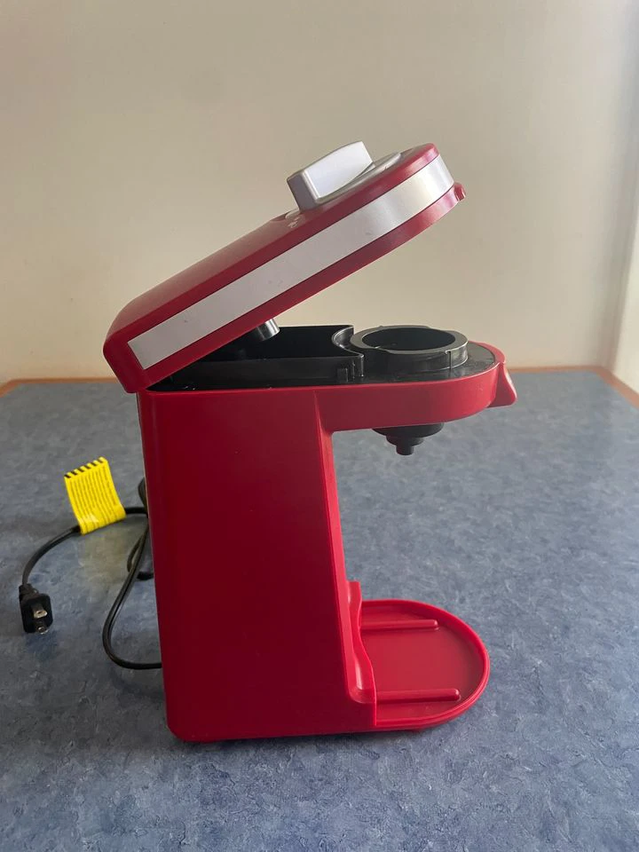 Side view of the Chulux Mini in red with the top open